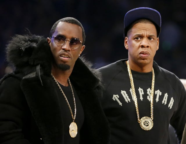 Rap moguls Sean &#34;Diddy&#34; Combs, left, and Jay-Z attend the NBA All-Star basketball game, Feb. 15, 2015, in New York.