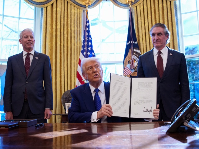 U.S. President Donald Trump signs an executive in the Oval Office at the White House on February 14, 2025 in Washington, DC. President Trump announced that his administration will withhold federal funding from schools and universities that impose a COVID-19 vaccine mandate. Trump was joined by, from left to right, Environmental Protection Agency (EPA) Administrator Lee Zeldin, Energy Secretary Chris Wright, Interior Secretary Doug Burgum and Transportation Secretary Sean Duffy. (Photo by Andrew Harnik/Getty Images)