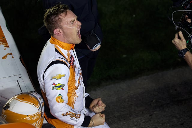Parker Kligerman, driver of the #75 Spiked Coolers Chevrolet celebrates after winning the NASCAR Craftsman Truck Series Fresh from Florida 250 at Daytona International Speedway on February 14, 2025 in Daytona Beach, Florida.