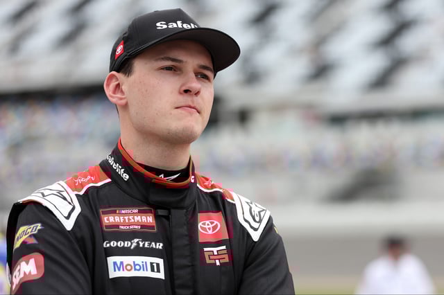Corey Heim, driver of the #11 Safelite Toyota looks on during qualifying for the NASCAR Craftsman Truck Series Fresh from Florida 250 at Daytona International Speedway on February 14, 2025 in Daytona Beach, Florida.