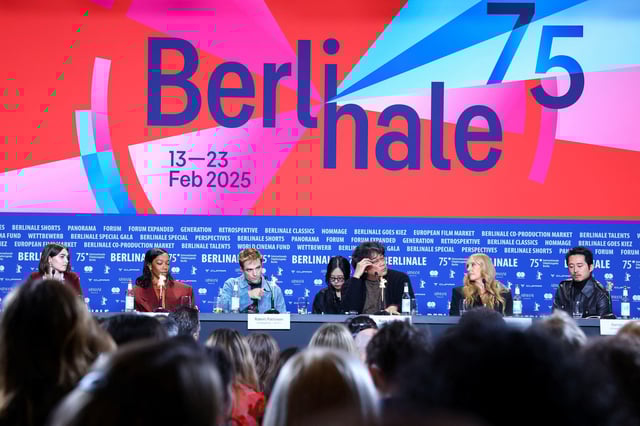 Cast members Steven Yeun, Toni Collette, Robert Pattinson, Anamaria Vartolomei and Naomi Ackie attend a press conference with director Bong Joon-Ho to promote the movie "MICKEY 17" at the 75th Berlinale International Film Festival in Berlin, Germany February 15, 2025. REUTERS/Nadja Wohlleben
