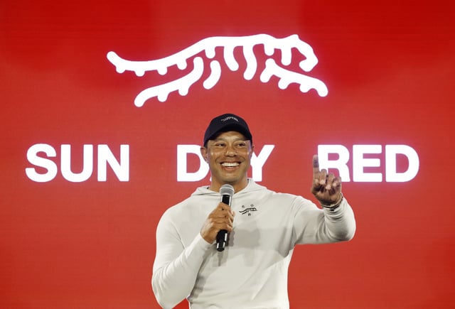 PACIFIC PALISADES, CALIFORNIA - FEBRUARY 12: Tiger Woods speaks during the launch of Tiger Woods and TaylorMade Golf&#39;s new apparel and footwear brand &#34;Sun Day Red&#34; at Palisades Village on February 12, 2024 in Pacific Palisades, California. (Photo by Kevork Djansezian/Getty Images)