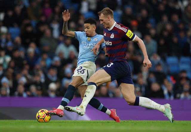Soccer Football - Premier League - Manchester City v Newcastle United - Etihad Stadium, Manchester, Britain - February 15, 2025 Manchester City's Savinho in action with Newcastle United's Dan Burn REUTERS/Phil Noble