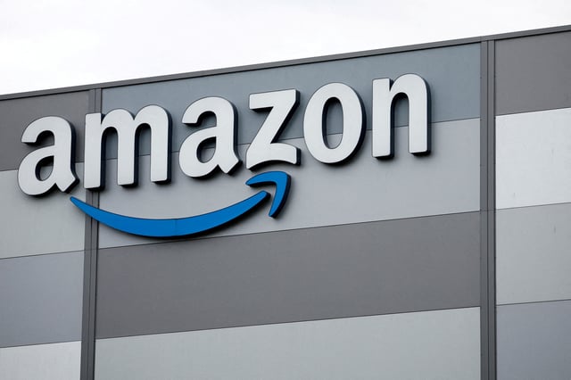 The logo of Amazon is pictured at the company logistics center in Carquefou near Nantes, France, October 15, 2024. REUTERS/Stephane Mahe/File Photo