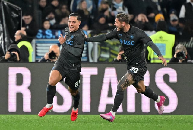 Soccer Football - Serie A - Lazio v Napoli - Stadio Olimpico, Rome, Italy - February 15, 2025 Napoli's Giacomo Raspadori celebrates scoring their first goal with Napoli's Pasquale Mazzocchi REUTERS/Alberto Lingria