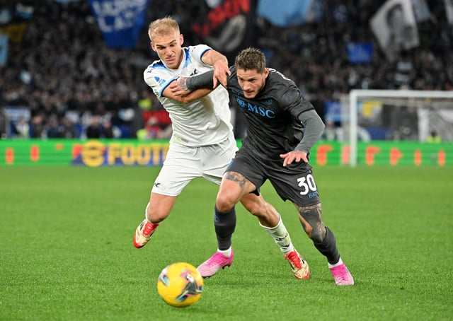 Soccer Football - Serie A - Lazio v Napoli - Stadio Olimpico, Rome, Italy - February 15, 2025 Napoli's Pasquale Mazzocchi in action with Lazio's Gustav Isaksen REUTERS/Alberto Lingria