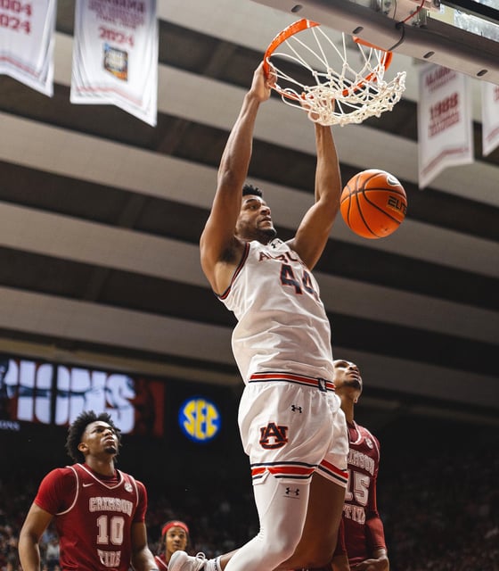 Auburn's Dylan Cardwell dunks against Alabama at Coleman Coliseum.