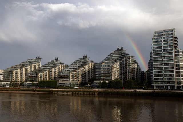 A rainbow is seen over apartments in Wandsworth on the River Thames as UK house prices continue to fall, in London, Britain, August 26, 2023.   REUTERS/Kevin Coombs/File Photo