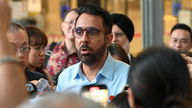 Pritam Singh, secretary-general of the opposition Workers' Party, speaks to reporters after the verdict in his trial for allegedly lying to the Committee of Privileges (COP), at the State court in Singapore on February 17, 2025. 