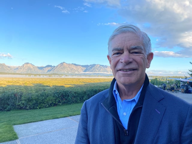 Federal Reserve Bank of Philadelphia President Patrick Harker stands behind the Jackson Lake Lodge in Jackson Hole, where the Kansas City Fed holds its annual economic symposium, in Wyoming, U.S. August 24, 2023. REUTERS/Ann Saphir