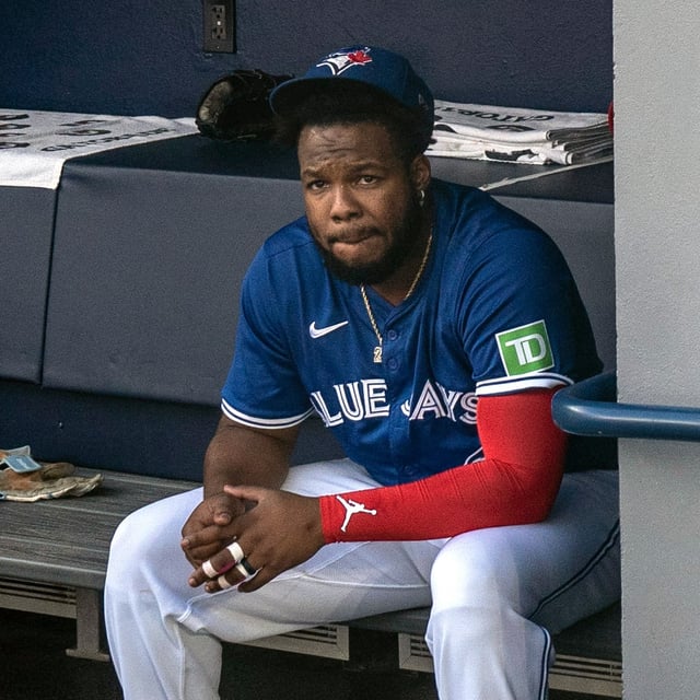 Toronto Blue Jays' Vladimir Guerrero Jr. sits in the dugout before a baseball game against the Miami Marlins in Toronto, Sunday, Sept. 29, 2024. THE CANADIAN PRESS/Chris Young