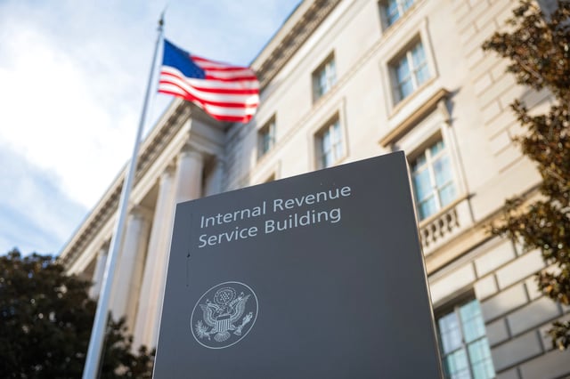 A sign for the Internal Revenue Service (IRS) is seen outside its building on February 13, 2025 in Washington, DC. Members of Elon Musk's Department of Government Efficiency (DOGE) arrived at the Internal Revenue Service to begin examining the agency's operations.