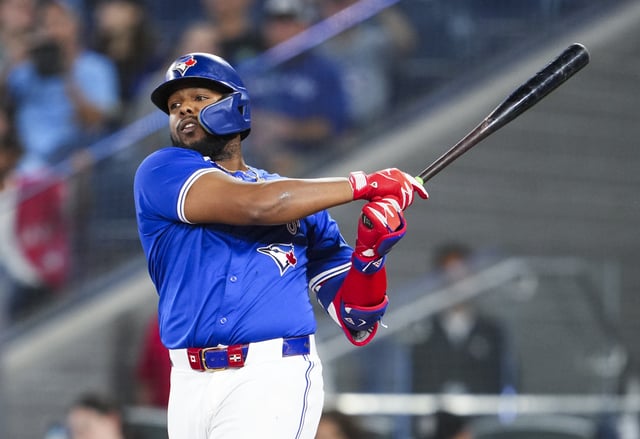 TORONTO, ON - SEPTEMBER 28: Vladimir Guerrero Jr. #27 of Toronto Blue Jays swings against the Miami Marlins during the ninth inning in their MLB game at the Rogers Centre on September 28, 2024 in Toronto, Ontario, Canada.