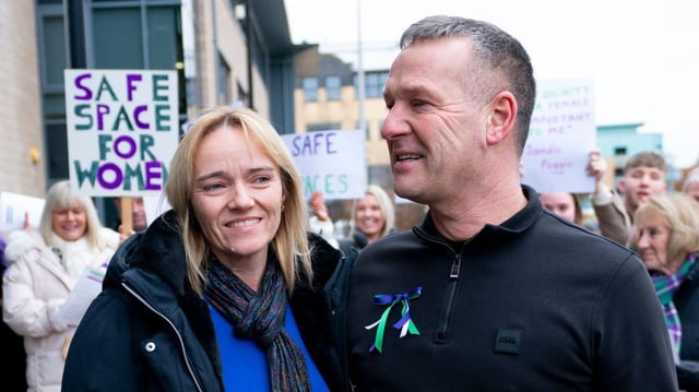 Sandie Peggie and her husband Darren with supporters outside the tribunal hearing in Dundee