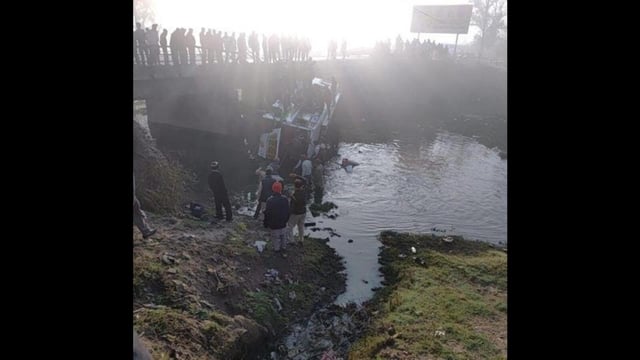 Rescue efforts underway after the bus fell into a drain on the Faridkot-Kotkapura road on Tuesday morning. (HT Photo)
