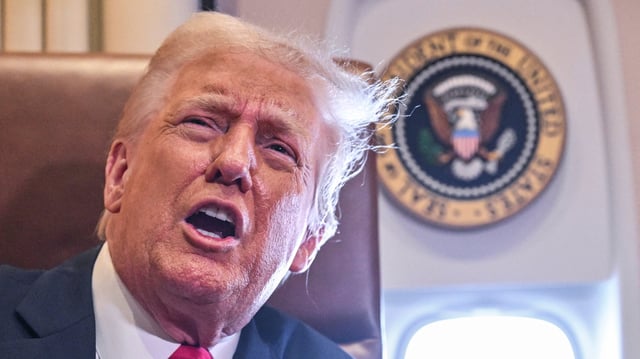 US President Donald Trump speaks to the press before signing a proclamation renaming the Gulf of Mexico as the Gulf of America aboard Air Force One enroute to New Orleans, Louisiana on Febrary 09, 2025. For years, as disputes over names on the map riled up nationalist passions in several parts of the world, US policymakers have watched warily, trying to stay out or to quietly encourage peace. Suddenly, the United States has gone from a reluctant arbiter to a nomenclature belligerent, as President Donald Trump declared that the Gulf of Mexico will henceforth be called the &#34;Gulf of America.&#34; In an executive order signed hours after he returned to the White House, Trump called the water body an &#34;indelible part of America&#34; critical to US oil production and fishing and &#34;a favorite destination for American tourism and recreation activities.&#34; (Photo by ROBERTO SCHMIDT / AFP) (Photo by ROBERTO SCHMIDT/AFP via Getty Images)