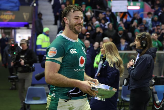 Rugby Union - Six Nations Championship - Scotland v Ireland - Murrayfield Stadium, Edinburgh, Scotland, Britain - February 9, 2025 Ireland's Caelan Doris celebrates with a trophy after the match REUTERS/Russell Cheyne/File Photo