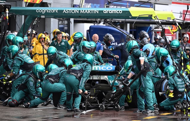 Formula One F1 - Monaco Grand Prix - Circuit de Monaco, Monte Carlo, Monaco - May 29, 2022 Aston Martin team members in action as Lance Stroll makes a pit stop during the race Pool via REUTERS/Christian Bruna/File Photo