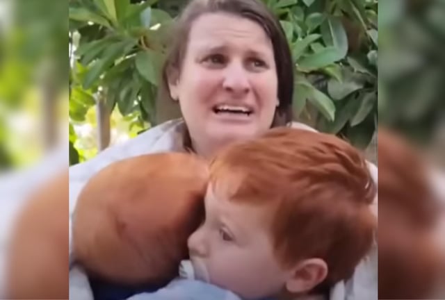 A screenshot from a video shows Shiri holding her sons Ariel and Kfir. The two Bibas brothers are the youngest captured on October 7.