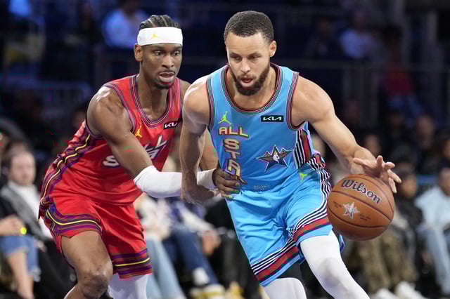 Feb 16, 2025; San Francisco, CA, USA; Shaq’s OGs guard Stephen Curry (30) of the Golden State Warriors controls the ball against Chuck’s Global Stars guard Shai Gilgeous-Alexander (2) of the Oklahoma City Thunder during the 2025 NBA All Star Game at Chase Center. Mandatory Credit: Kyle Terada-Imagn Images/File Photo