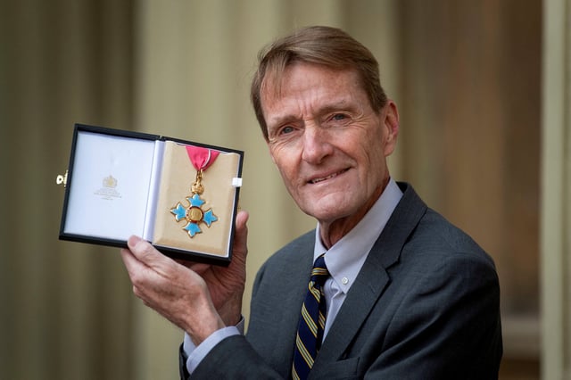 Author Lee Child, real name James Grant, who wrote the Jack Reacher novels, poses with his CBE for services to literature following an investiture ceremony at Buckingham Palace in London, Britain February 14, 2020. Victoria Jones/Pool via REUTERS/File Photo