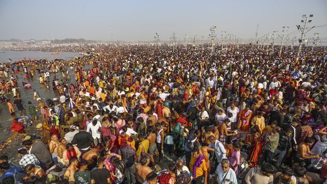 Devotees take a holy dip in the Ganga river during the ongoing Maha Kumbh Mela festival, in Prayagraj, Wednesday, Feb. 19, 2025. 
