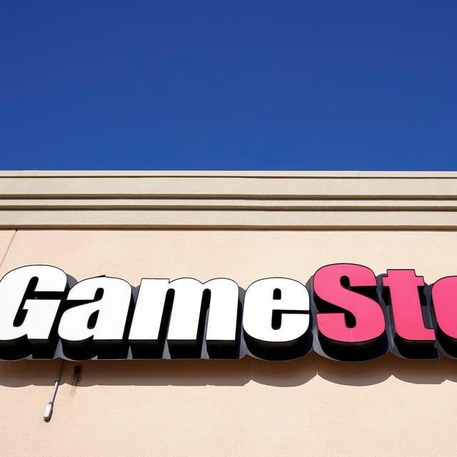 FILE - In this file photo, a GameStop sign is displayed above a store in Urbandale, Iowa, on Jan. 28, 2021. Gamestop's CEO Ryan Cohen promised to cut costs and focus on long-term profitability for the struggling video game retailer in an annual shareholder meeting Monday, June 17, 2024. (AP Photo/Charlie Neibergall, File)