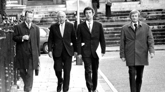 Haines, left, with Harold Wilson, second left