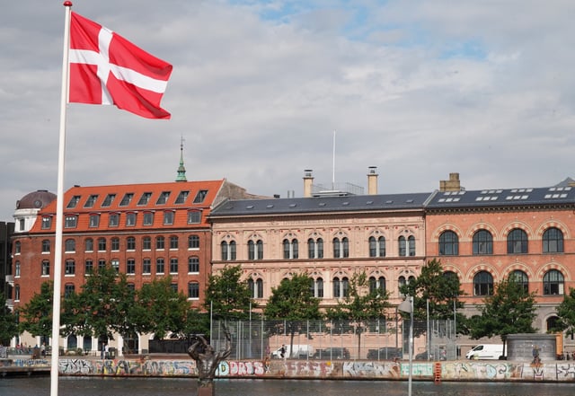A Danish flag flies outside the foreign ministry in Copenhagen, Denmark, July 31, 2023. REUTERS/Tom Little/File Photo