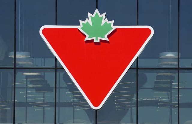 Canadian Tire Corp. Ltd. says it has signed an almost $1.3 billion deal to sell Helly Hansen to a U.S. owner of several clothing brands. A Canadian Tire logo is displayed on a store in Ottawa on Friday, Aug. 11, 2023. THE CANADIAN PRESS/Sean Kilpatrick