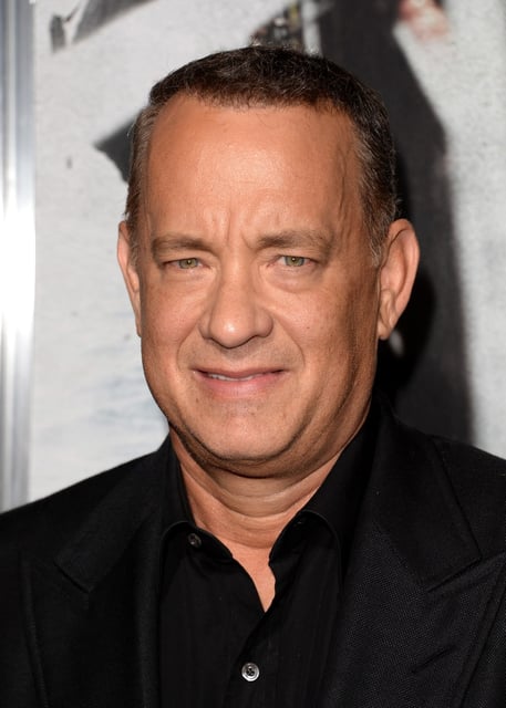 Actor Tom Hanks, during a skit on Saturday Night Live&#39;s 50th anniversary show, reprised his recurring character Doug, who appears as a contestant in the parody game show “Black Jeopardy.” Doug wears a &#34;Make America Great Again&#34; hat and an American flag T-shirt, and he is the only white character on the parody show. (Getty Images/Jason Merritt)