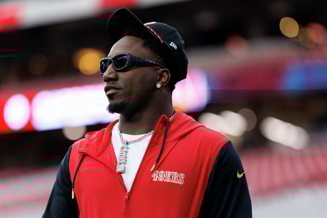 Wide receiver Deebo Samuel Sr. of the San Francisco 49ers stands on the field prior to an NFL football game against the Arizona Cardinals at State Farm Stadium on Jan. 5, 2025, in Glendale, Ariz.