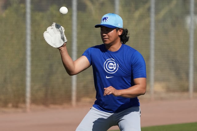 Feb 10, 2025; Mesa, AZ, USA; Chicago Cubs pitcher Shota Imanaga (18) runs through drills during spring training camp. Mandatory Credit: Rick Scuteri-Imagn Images/File Photo