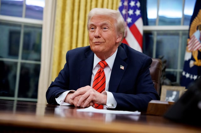 President Donald Trump reacts to a question from a reporter on February 10 in Washington, DC. 