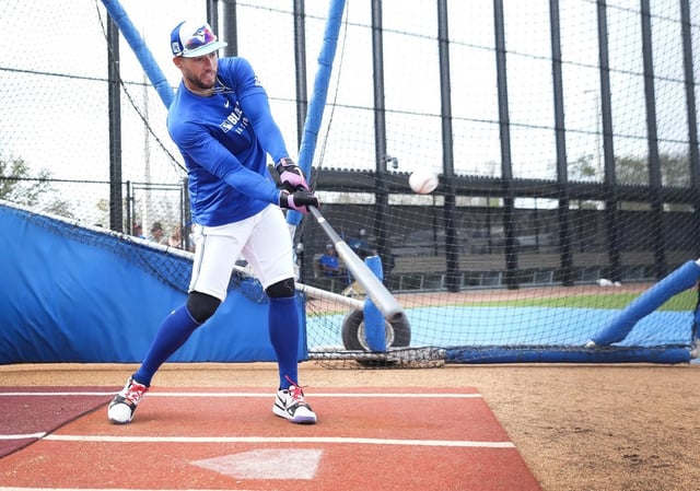 Toronto Blue Jays outfielder George Springer hits the ball in batting practice during spring training in Dunedin, Fla., on Wednesday, February 19, 2025. THE CANADIAN PRESS/Nathan Denette