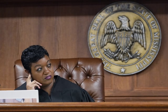 FILE - Hinds County Chancery Judge Crystal Wise Martin listens to lawyer Rob McDuff, an attorney for Parents For Public Schools, during a hearing in Jackson, Miss., Aug. 23, 2022. (AP Photo/Rogelio V. Solis, File)