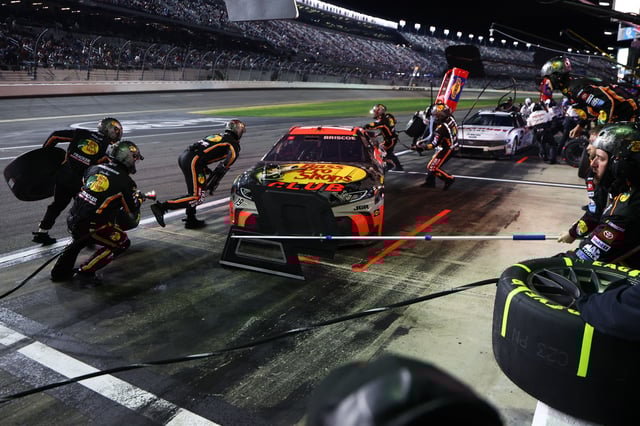 Feb 16, 2025; Daytona Beach, Florida, USA; NASCAR Cup Series driver Chase Briscoe (19) makes a pit stop during the Daytona 500 at Daytona International Speedway. Mandatory Credit: Peter Casey-Imagn Images/File Photo