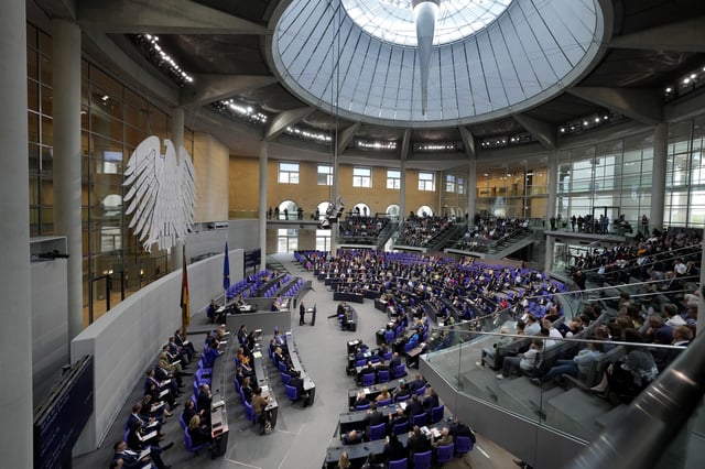 FILE - German Chancellor Olaf Scholz speaks during a general debate of the German parliament Bundestag in Berlin, Germany, Sept.11, 2024. (AP Photo/Markus Schreiber, File)