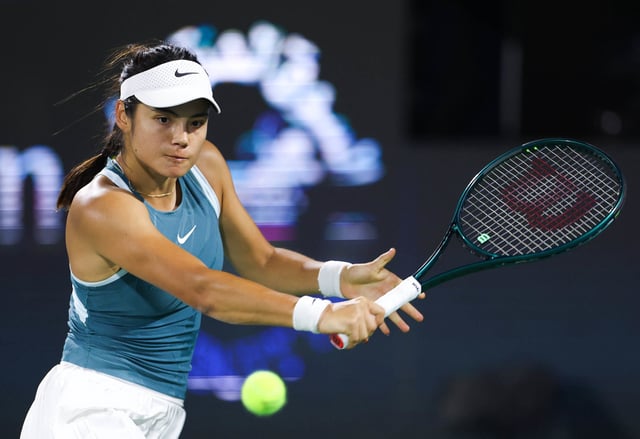Emma Raducanu of Great Britain plays a backhand in her first round match against Maria Sakkari of Greece during the Dubai Duty Free Tennis Championships, part of the Hologic WTA Tour at Dubai Duty Free Tennis Stadium on February 16, 2025 in Dubai, United Arab Emirates. 