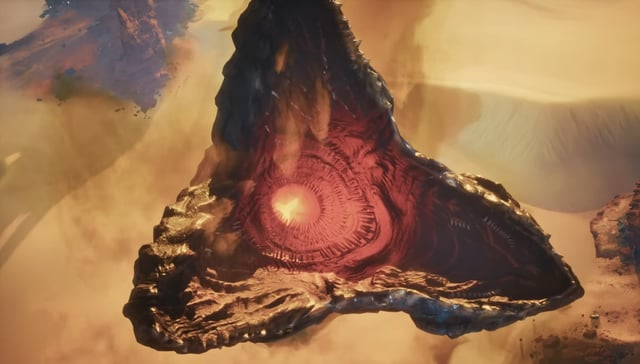 A Dune: Awakening screenshot showing a giant sandworm emerging from the ground.