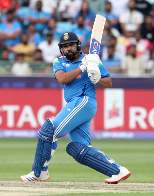 Cricket - ICC Men's Champions Trophy - Group A - Bangladesh v India - Dubai International Stadium, Dubai, United Arab Emirates - February 20, 2025 India's Rohit Sharma in action REUTERS/Satish Kumar