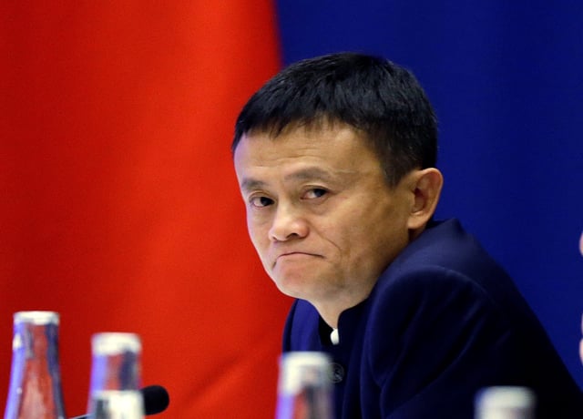 Chinese CEO Jack Ma of Alibaba listens to Chinese President Xi Jinping at a U.S.-China business roundtable, comprised of U.S. and Chinese CEOs in Seattle, Washington September 23, 2015.