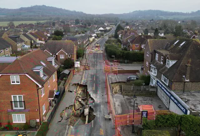 A drone view shows a large sinkhole in Godstone, a village in southern Britain.