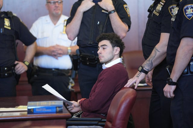 Luigi Mangione, the suspect in the killing of UnitedHealth Group chief executive Brian Thompson, appears in Manhattan Supreme Court for his arraignment hearing in New York City on Dec. 23, 2024.