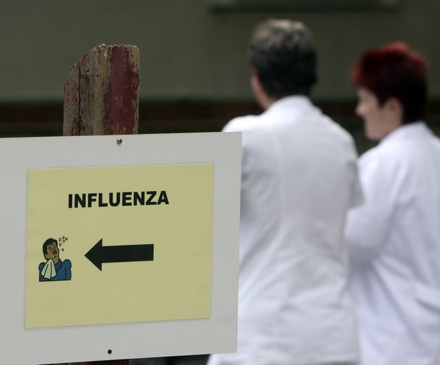 File photo of a placard leading the way to the department at the Kaiser Franz Josef hospital in Vienna, where influenza patients are treated, seen Wednesday, April 29, 2009.
