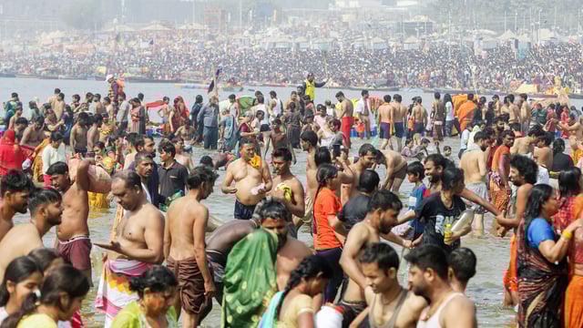 Devotees take a dip at Triveni Sangam during the ongoing Maha Kumbh 2025, in Prayagraj on Thursday. (ANI Photo)
