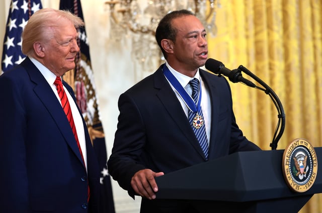 Golf legend Tiger Woods speaks alongside U.S. President Donald Trump during a reception honoring Black History Month in the East Room of the White House on February 20, 2025 in Washington, DC. The Black History Month celebration comes as Trump has signed a series of executive orders ending federal diversity, equity and inclusion (DEI) programs and cutting funding to schools and Universities that do not cut DEI programs.