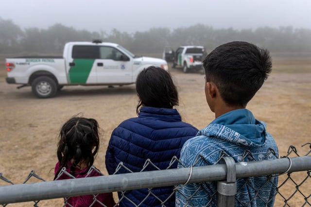 Unaccompanied minors wait to be processed by U.S. Border Patrol agents near the U.S.-Mexico border on April 10, 2021 in La Joya, Texas. 