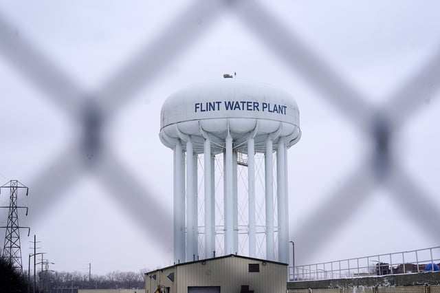 FILE - The Flint water plant tower is seen, Thursday, Jan. 6, 2022, in Flint, Mich. (AP Photo/Carlos Osorio, File)