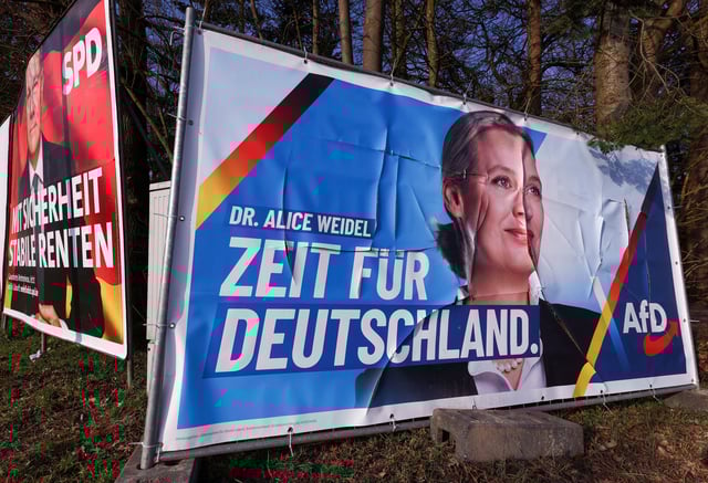 Election campaign posters for Social Democratic Party (SPD) chancellor Olaf Scholz and Alternative for Germany party (AfD) co-leader and candidate for chancellor Alice Weidel are pictured ahead of the upcoming general election, in Amelinghausen near Hamburg, Germany February 8, 2025. REUTERS/Thilo Schmuelgen/File Photo